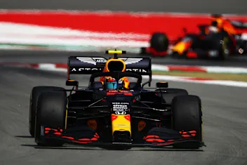 BARCELONA, SPAIN - AUGUST 14: Alexander Albon of Thailand driving the (23) Aston Martin Red Bull