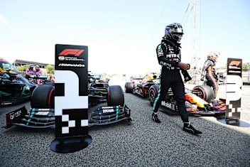 BARCELONA, SPAIN - AUGUST 15: Pole position qualifier Lewis Hamilton of Great Britain and Mercedes