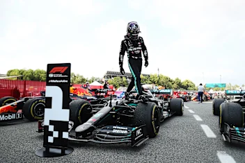 BARCELONA, SPAIN - AUGUST 16: Race winner Lewis Hamilton of Great Britain and Mercedes GP steps off