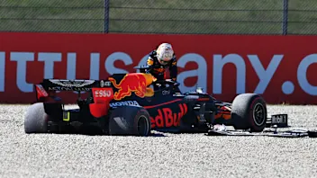 SCARPERIA, ITALY - SEPTEMBER 13: Max Verstappen of Netherlands and Red Bull Racing climbs out of