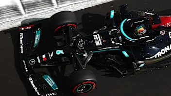 ABU DHABI, UNITED ARAB EMIRATES - DECEMBER 10: Lewis Hamilton of Great Britain driving the (44)