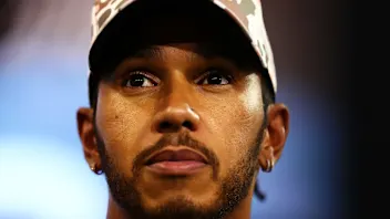 ABU DHABI, UNITED ARAB EMIRATES - DECEMBER 11: Second place qualifier Lewis Hamilton of Great