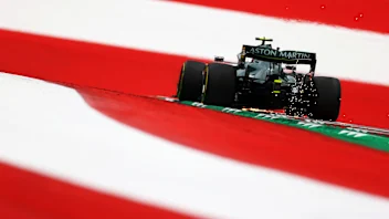 SPIELBERG, AUSTRIA - JULY 02: Sparks fly behind Sebastian Vettel of Germany driving the (5) Aston