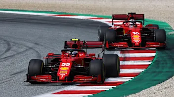 SPIELBERG, AUSTRIA - JULY 04: Carlos Sainz of Spain driving the (55) Scuderia Ferrari SF21 leads