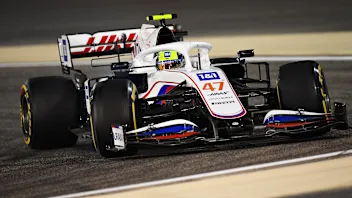 BAHRAIN, BAHRAIN - MARCH 28: Mick Schumacher of Germany driving the (47) Haas F1 Team VF-21 Ferrari