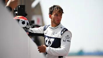 BAHRAIN, BAHRAIN - MARCH 12: Pierre Gasly of France and Scuderia AlphaTauri looks on from the grid
