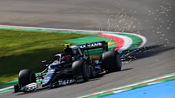 IMOLA, ITALY - APRIL 16: Sparks fly behind Pierre Gasly of France driving the (10) Scuderia