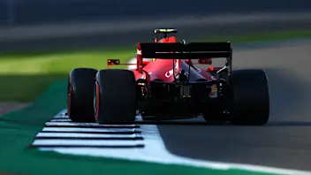 NORTHAMPTON, ENGLAND - JULY 16: Carlos Sainz of Spain driving the (55) Scuderia Ferrari SF21 during