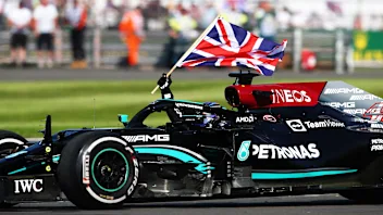 NORTHAMPTON, ENGLAND - JULY 18: Race winner Lewis Hamilton of Great Britain driving the (44)