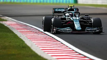BUDAPEST, HUNGARY - AUGUST 01: Sebastian Vettel of Germany driving the (5) Aston Martin AMR21