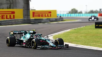 BUDAPEST, HUNGARY - AUGUST 01: Sebastian Vettel of Germany driving the (5) Aston Martin AMR21