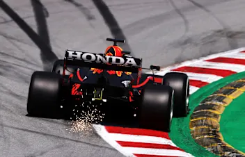 BARCELONA, SPAIN - MAY 07: Sparks fly behind the car of Max Verstappen of the Netherlands driving