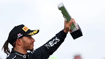NORTHAMPTON, ENGLAND - JULY 03: Third placed Lewis Hamilton of Great Britain and Mercedes