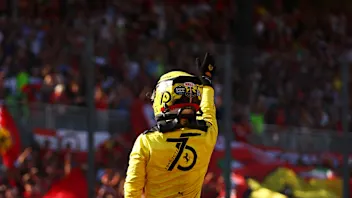 MONZA, ITALY - SEPTEMBER 10: Pole position qualifier Charles Leclerc of Monaco and Ferrari waves to