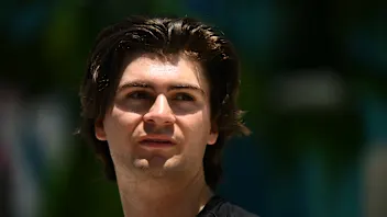 MIAMI, FLORIDA - MAY 05: IndyCar driver Colton Herta of United States looks on in the Paddock