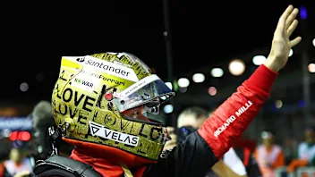 SINGAPORE, SINGAPORE - OCTOBER 01: Pole position qualifier Charles Leclerc of Monaco and Ferrari