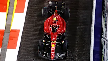 SINGAPORE, SINGAPORE - OCTOBER 02: Carlos Sainz of Spain driving (55) the Ferrari F1-75 on track