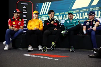 MELBOURNE, AUSTRALIA - MARCH 30: Charles Leclerc of Monaco and Ferrari, Oscar Piastri of Australia