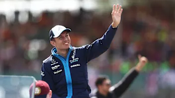 NORTHAMPTON, ENGLAND - JULY 09: Alexander Albon of Thailand and Williams waves to the crowd from