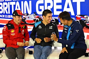 NORTHAMPTON, ENGLAND - JULY 06: Charles Leclerc of Monaco and Ferrari, Esteban Ocon of France and