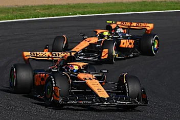 SUZUKA, JAPAN - SEPTEMBER 24: Oscar Piastri of Australia driving the (81) McLaren MCL60 Mercedes leads Lando Norris of Great Britain driving the (4) McLaren MCL60 Mercedes during the F1 Grand Prix of Japan at Suzuka
