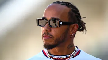 AUSTIN, TEXAS - OCTOBER 19: Lewis Hamilton of Great Britain and Mercedes walks in the Paddock