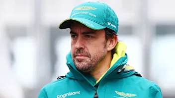 SUZUKA, JAPAN - APRIL 05: Fernando Alonso of Spain and Aston Martin F1 Team walks in the Paddock