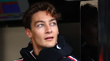 ZANDVOORT, NETHERLANDS - AUGUST 23: George Russell of Great Britain and Mercedes looks on in the