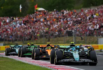 BUDAPEST, HUNGARY - AUGUST 03: Fernando Alonso of Spain driving the (14) Aston Martin F1 Team AMR25