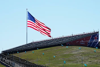 AUSTIN, TEXAS - OCTOBER 21: The flag of the United States flies above the first corner during