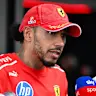MONZA, ITALY - SEPTEMBER 03: Lewis Hamilton of Great Britain and Scuderia Ferrari looks on in the