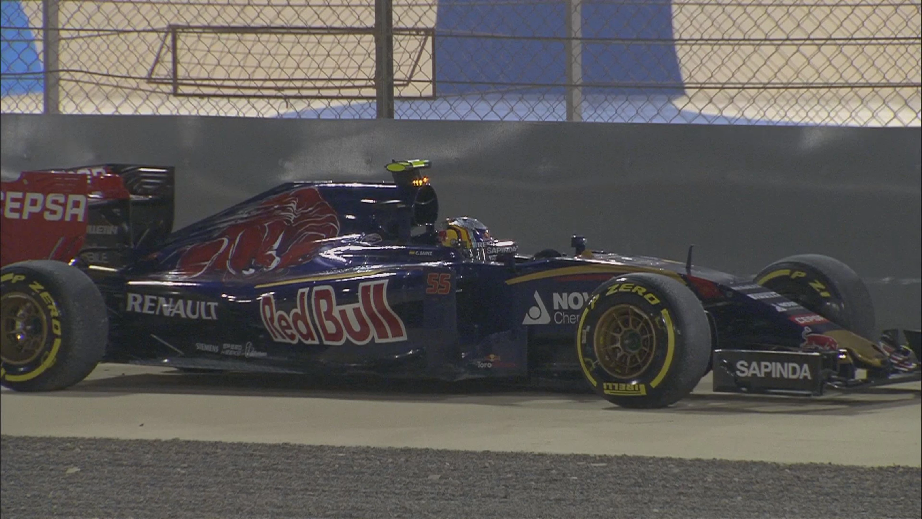 Carlos Sainz retires on Lap 30 in the Toro Rosso