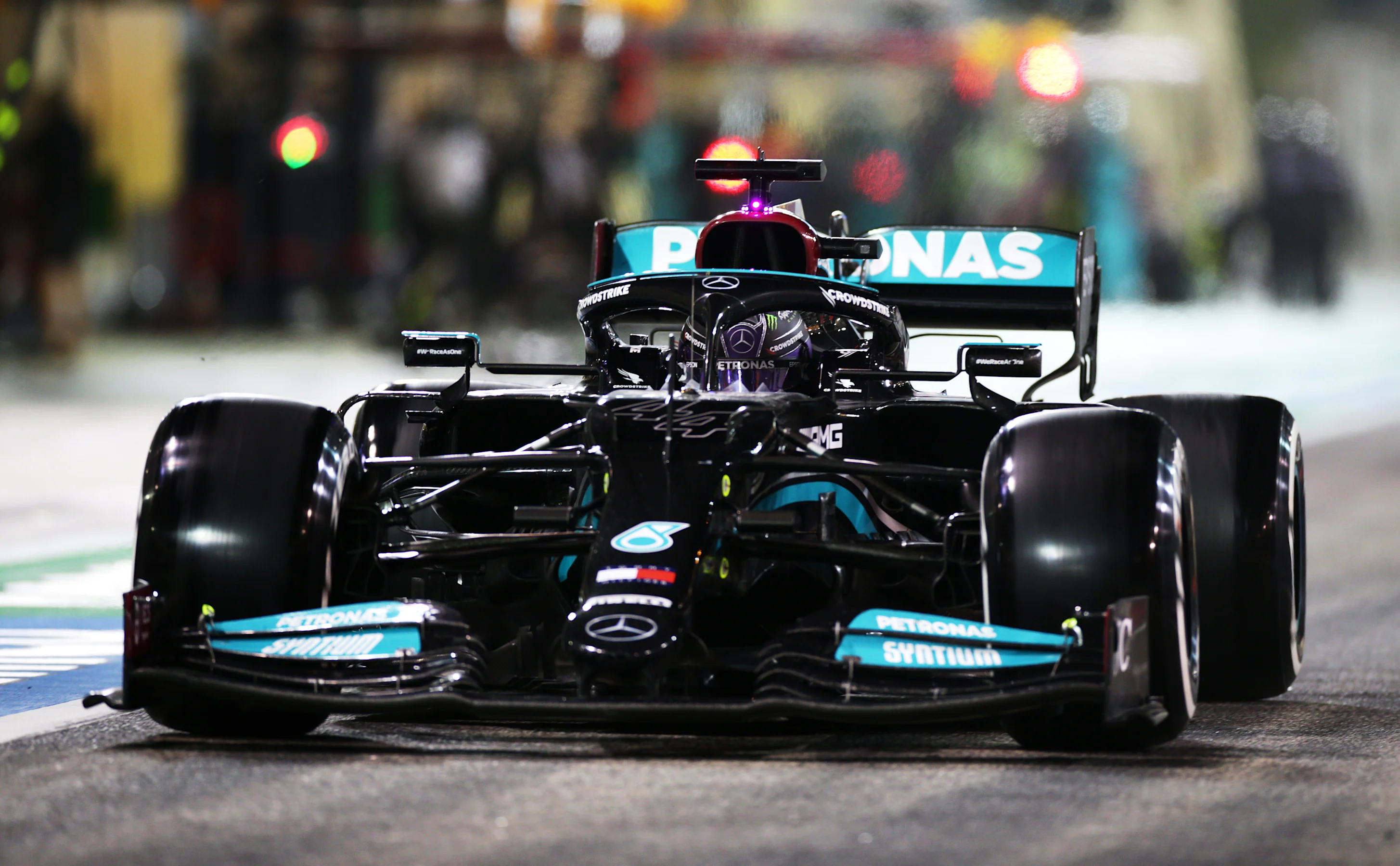 BAHRAIN, BAHRAIN - MARCH 28: Lewis Hamilton of Great Britain driving the (44) Mercedes AMG Petronas