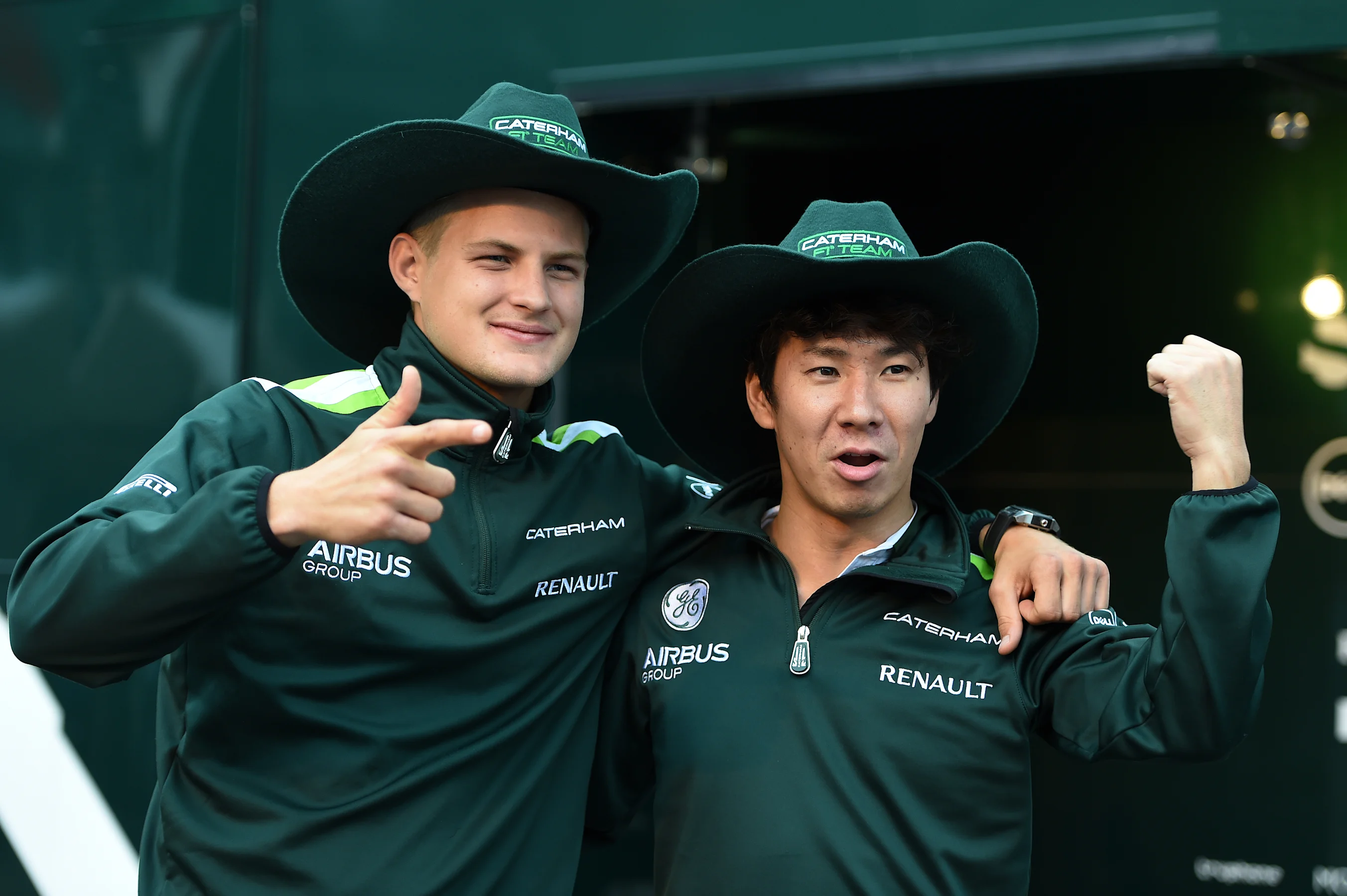 Marcus Ericsson (SWE) Caterham and Kamui Kobayashi (JPN) Caterham with USGP cowboy hats. Formula