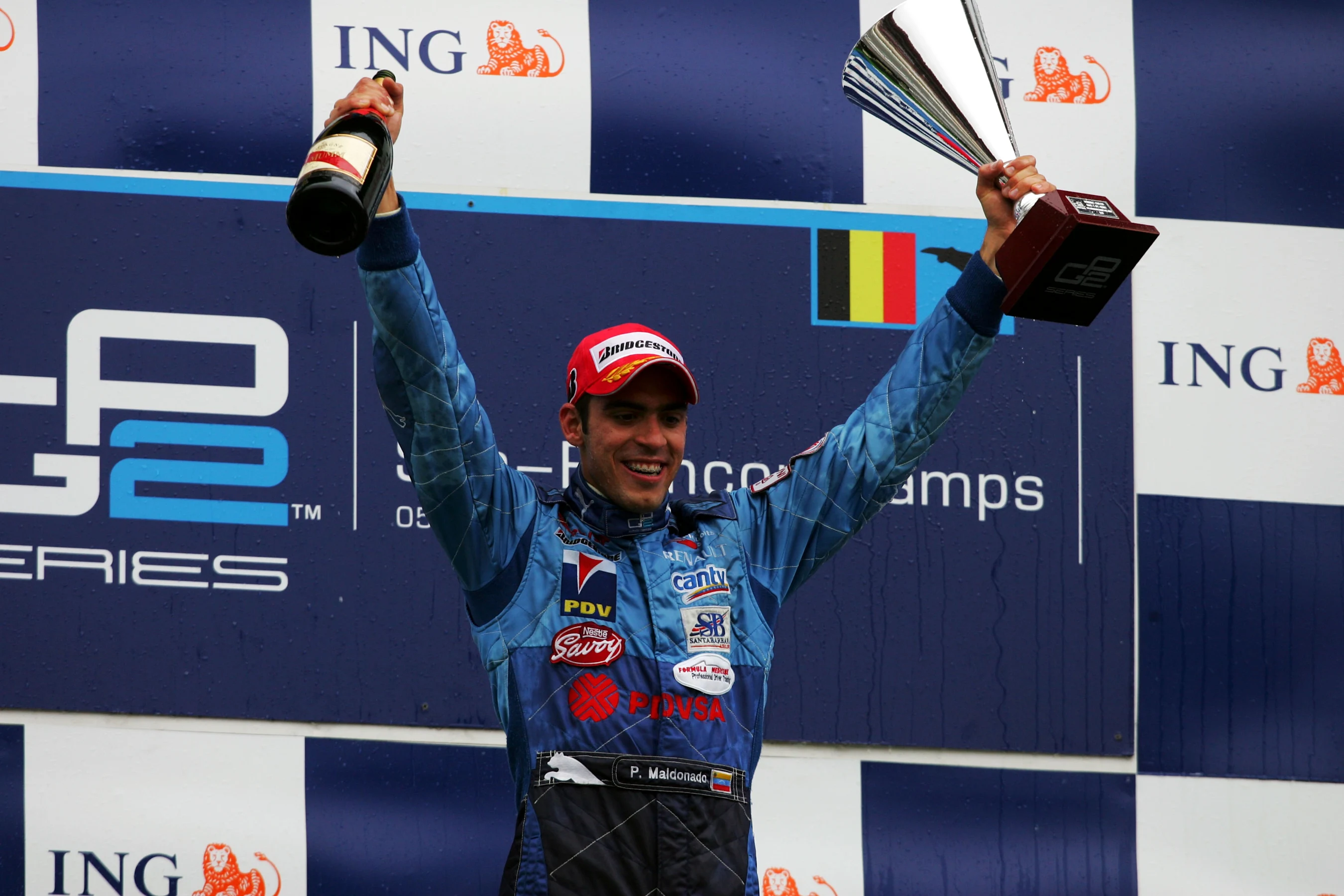 Race winner Pastor Maldonado (VEN) Piquet Sports celebrates on the podium. GP2 Series, Rd 9, Race
