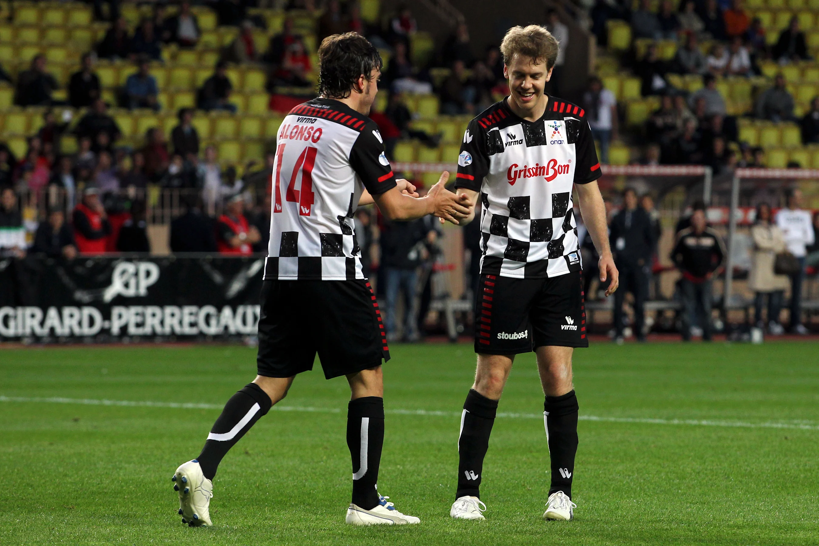 Fernando Alonso (ESP) Ferrari and Sebastian Vettel (GER) Red Bull Racing at the Monaco All Stars