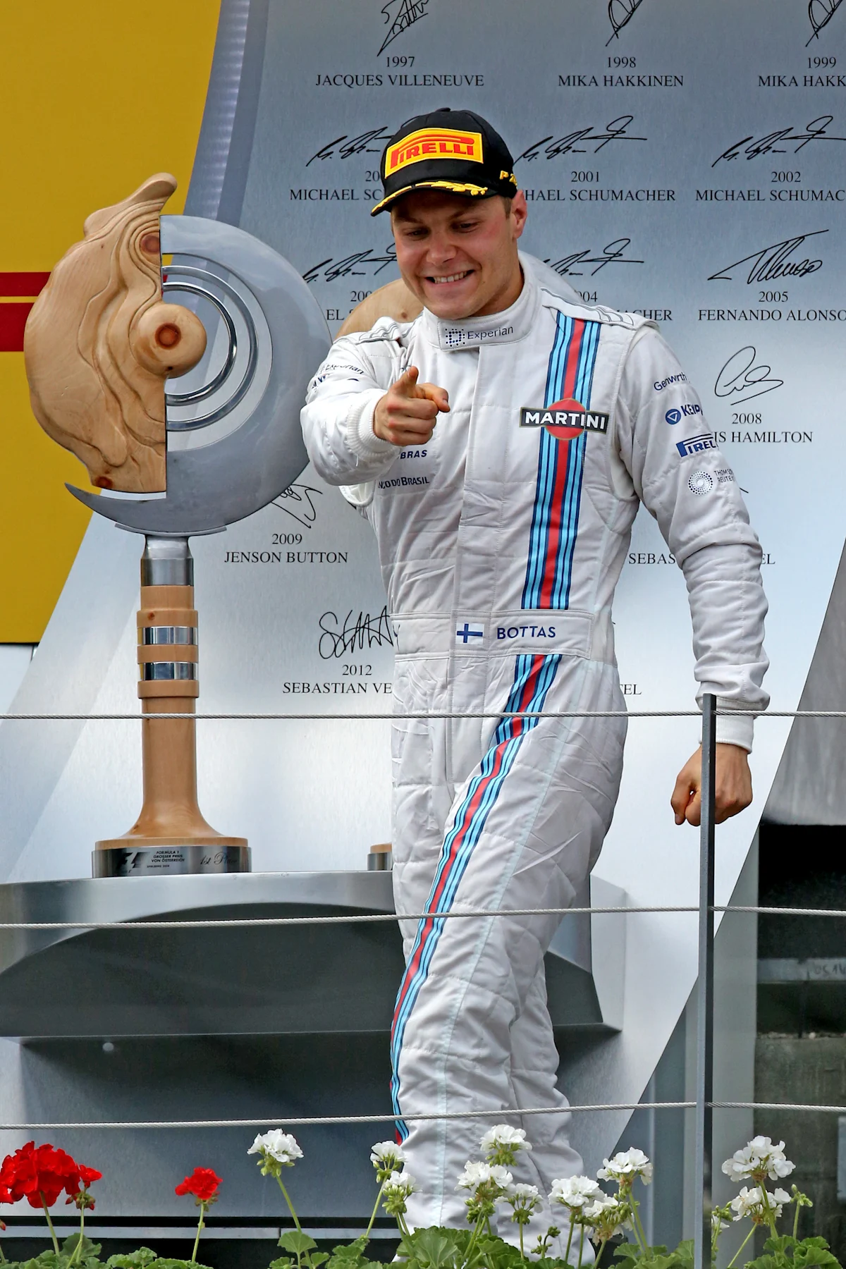 Valtteri Bottas (FIN) Williams celebrates on the podium. Formula One World Championship, Rd8,