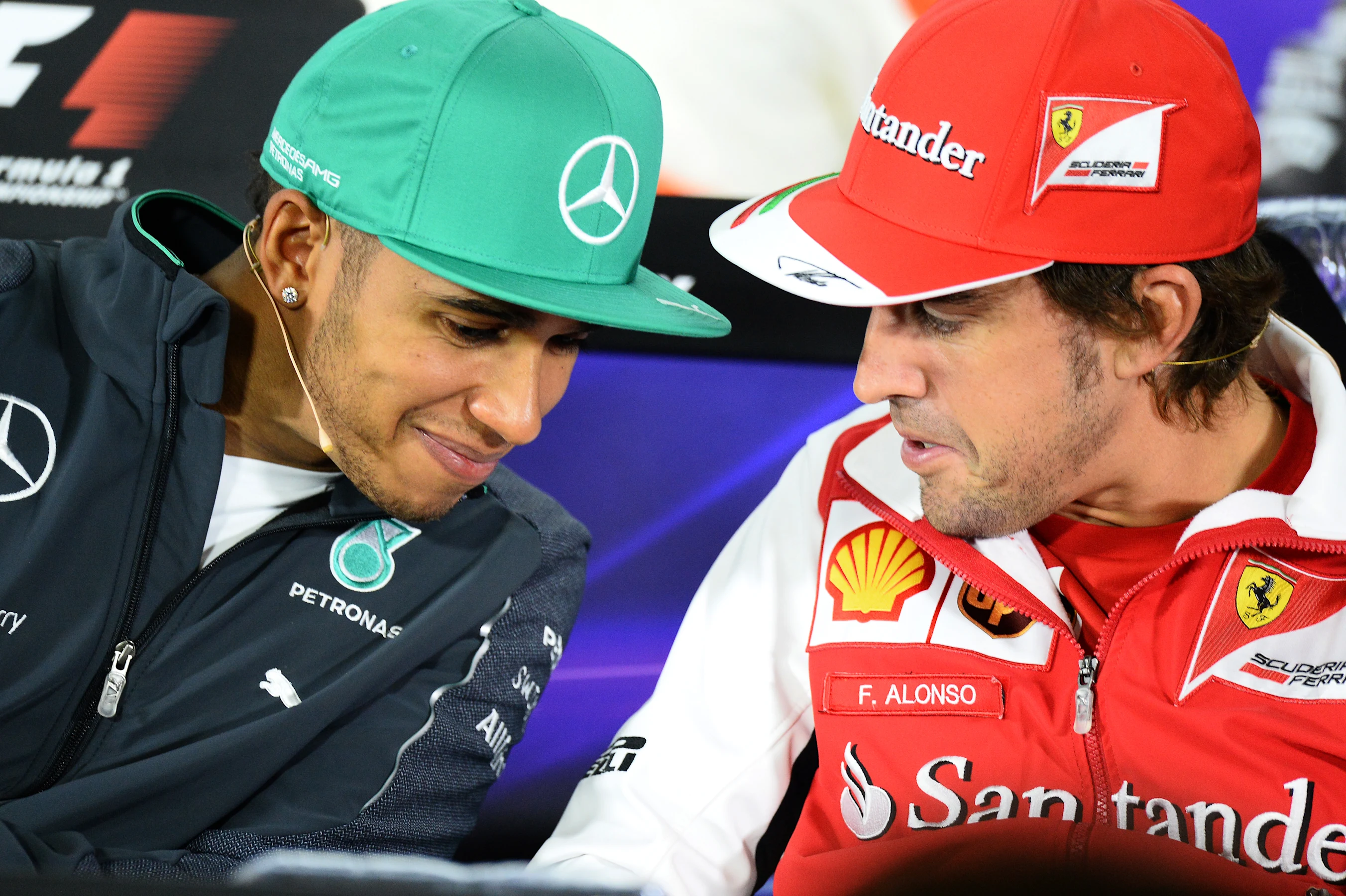 Lewis Hamilton (GBR) Mercedes AMG F1 and Fernando Alonso (ESP) Ferrari in the Press
