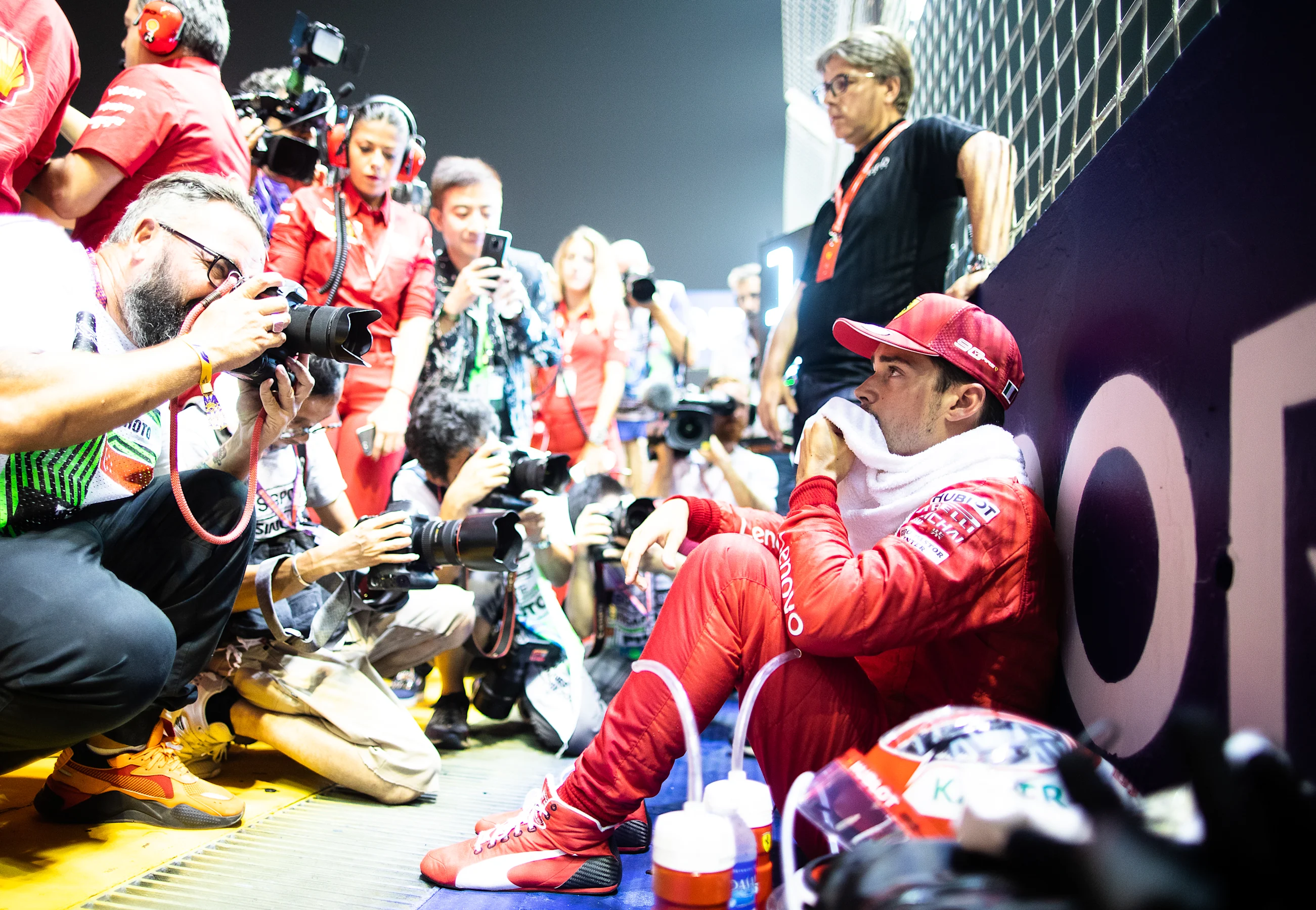 SINGAPORE, SINGAPORE - SEPTEMBER 22: Charles Leclerc of Monaco and Ferrari prepares to drive on the