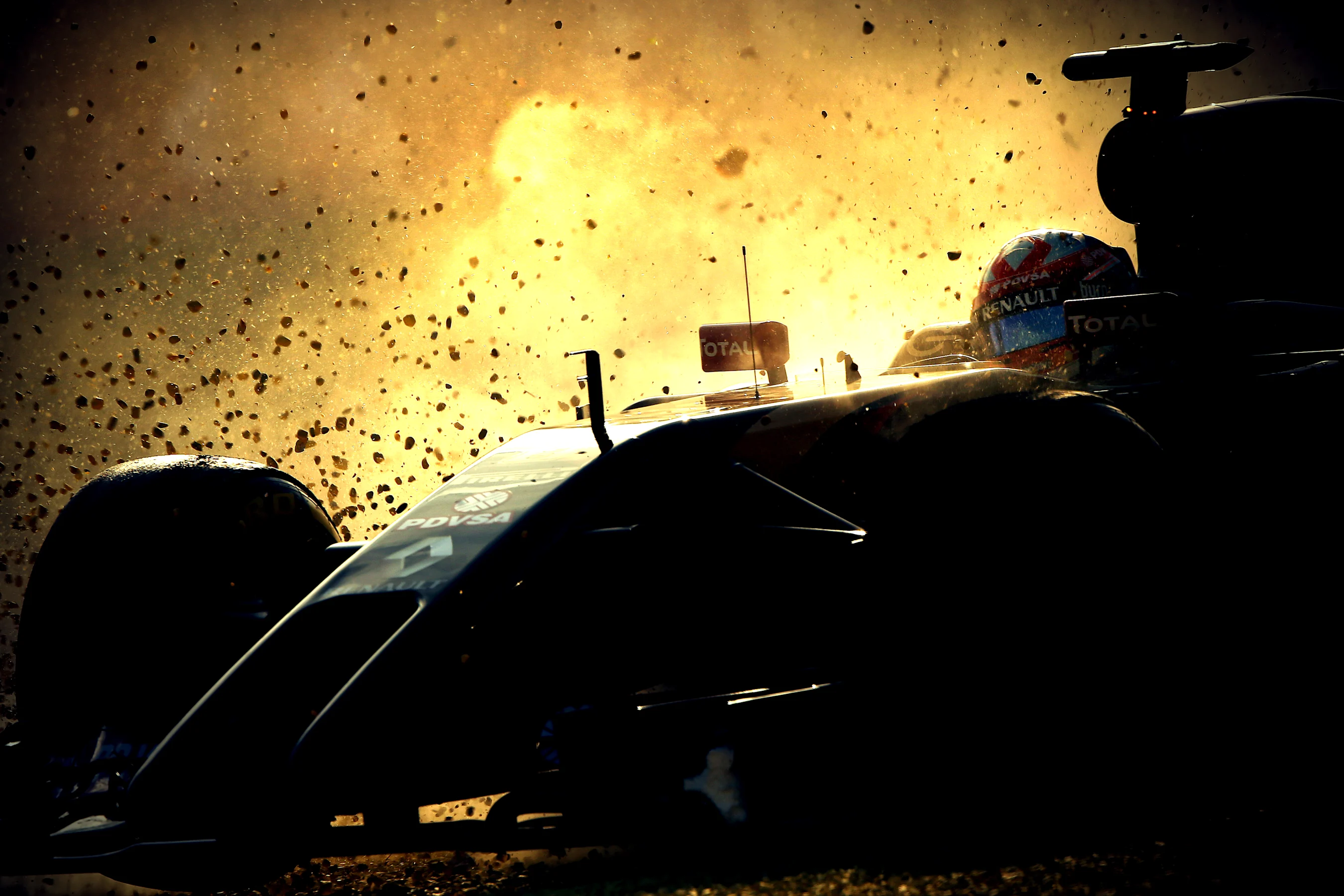 Romain Grosjean (FRA) Lotus E22 spins into the gravel. Formula One World Championship, Rd1,