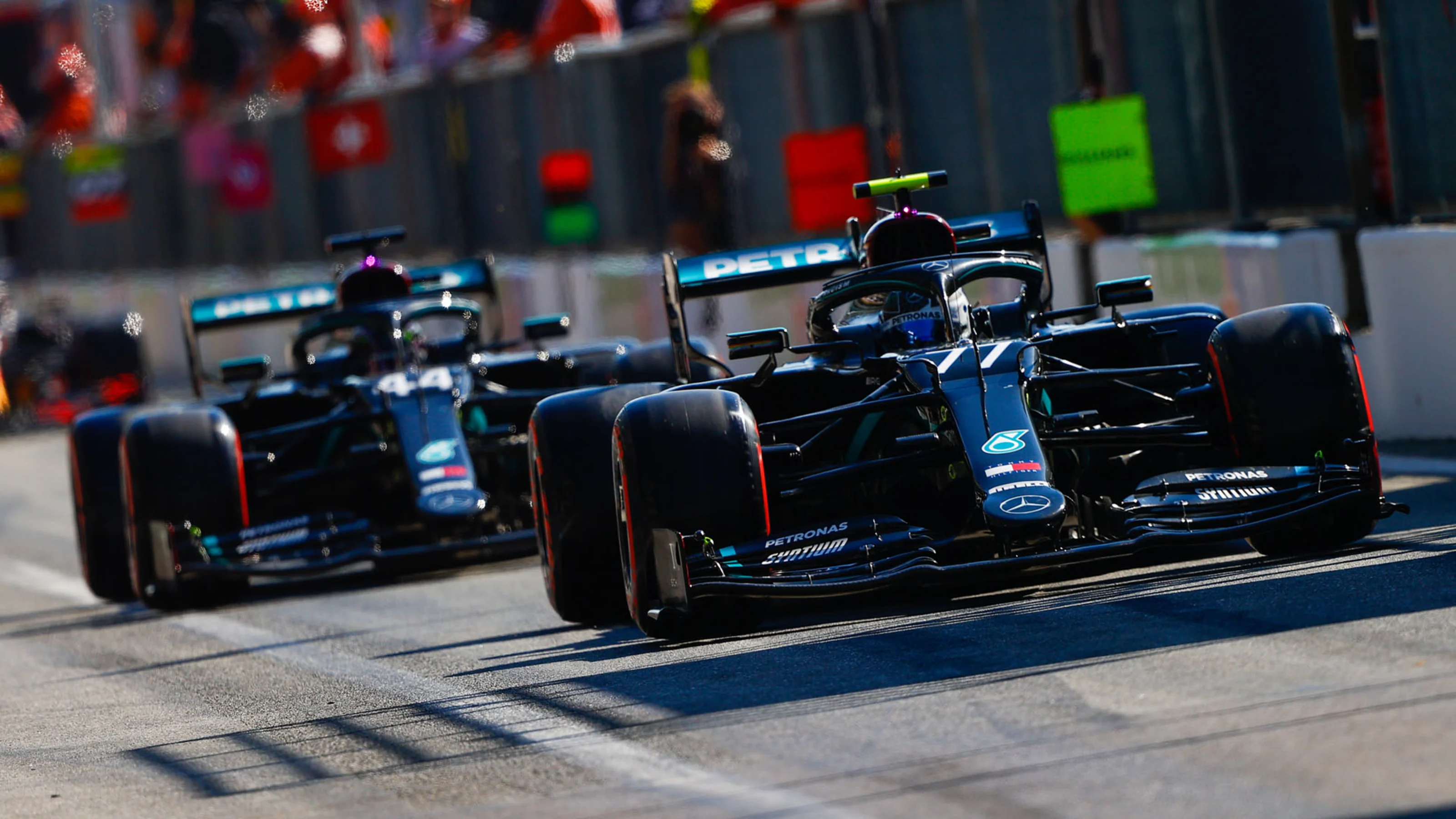 Valtteri Bottas, Mercedes F1 W11 EQ Performance, leads Lewis Hamilton, Mercedes F1 W11 EQ