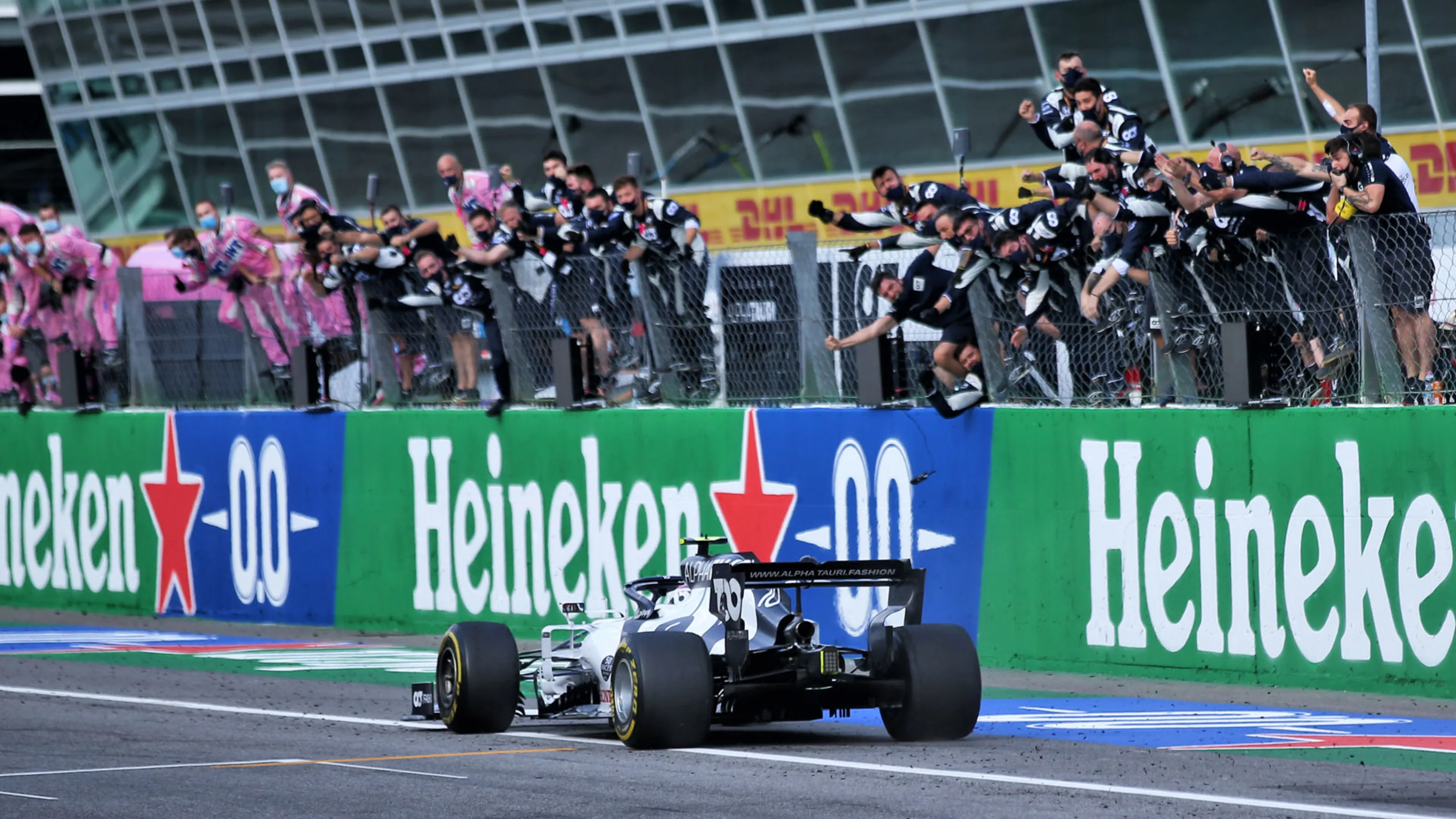Race winner Pierre Gasly (FRA) AlphaTauri AT01 celebrates as he passes his team at the end of the
