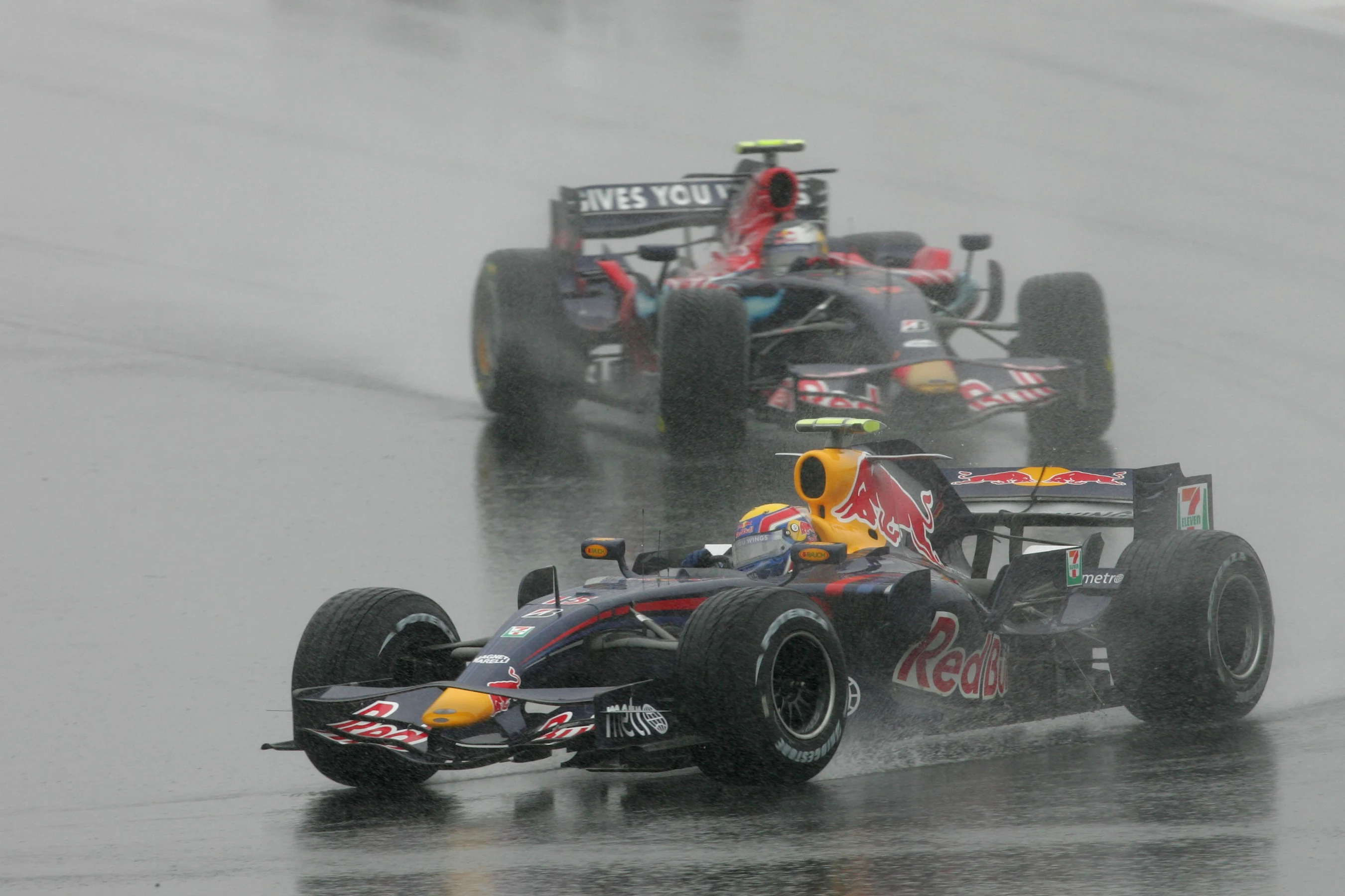 Mark Webber (AUS) Red Bull Racing RB3 leads Sebastian Vettel (GER) Scuderia Toro Rosso