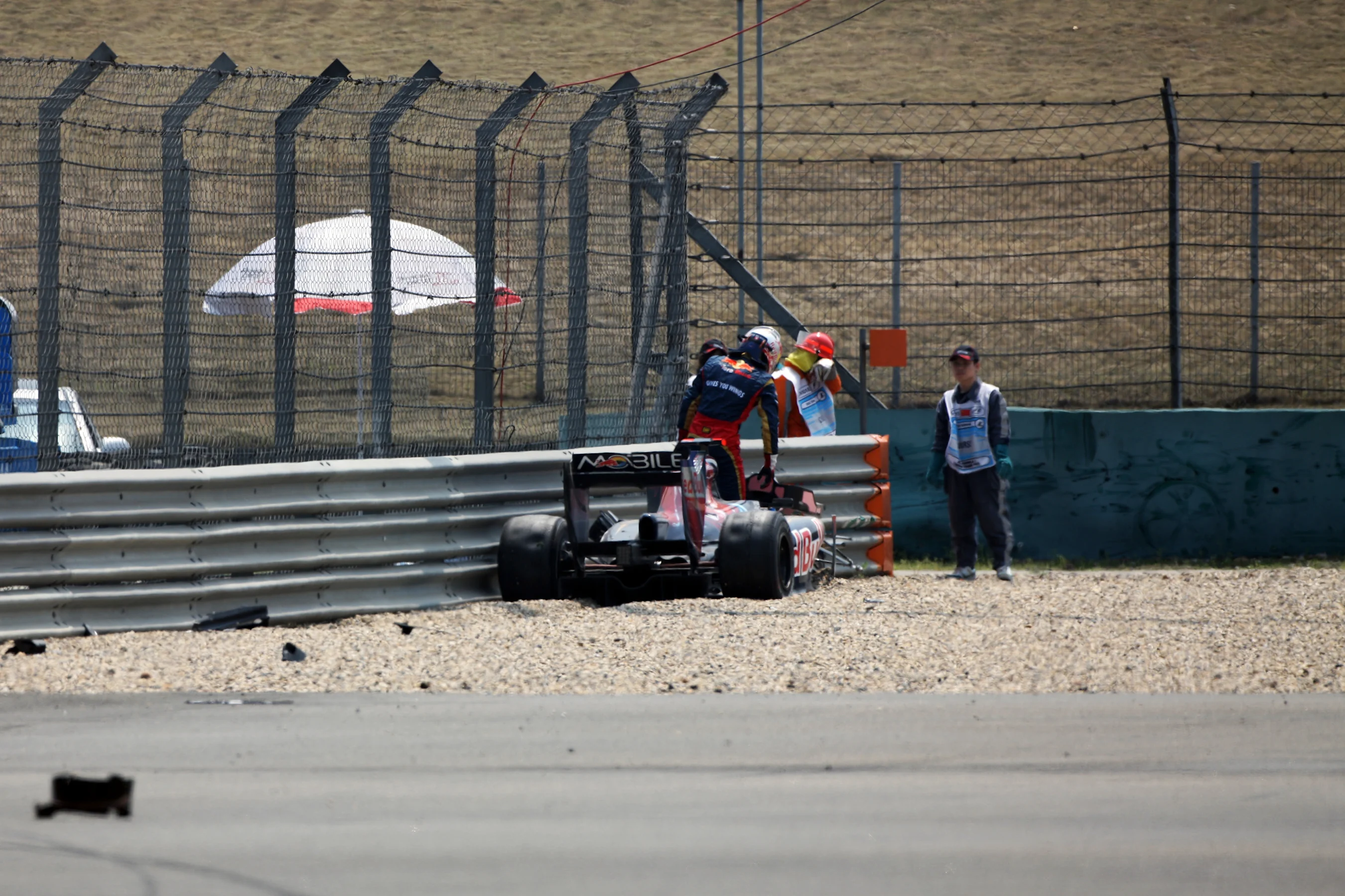 Sebastien Buemi (SUI) Scuderia Toro Rosso STR5 crashed in the first practice session.  Formula