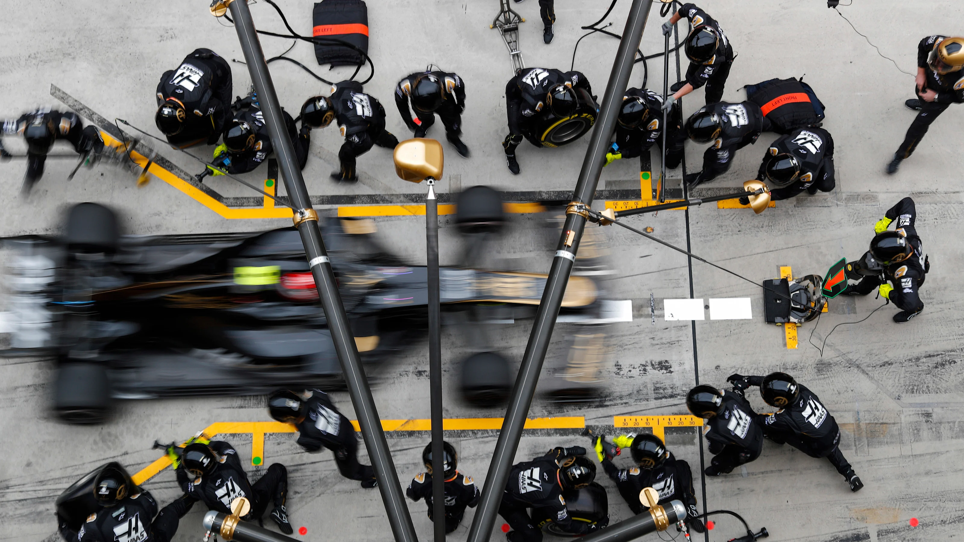 SHANGHAI INTERNATIONAL CIRCUIT, CHINA - APRIL 14: Kevin Magnussen, Haas VF-19, makes a pit stop