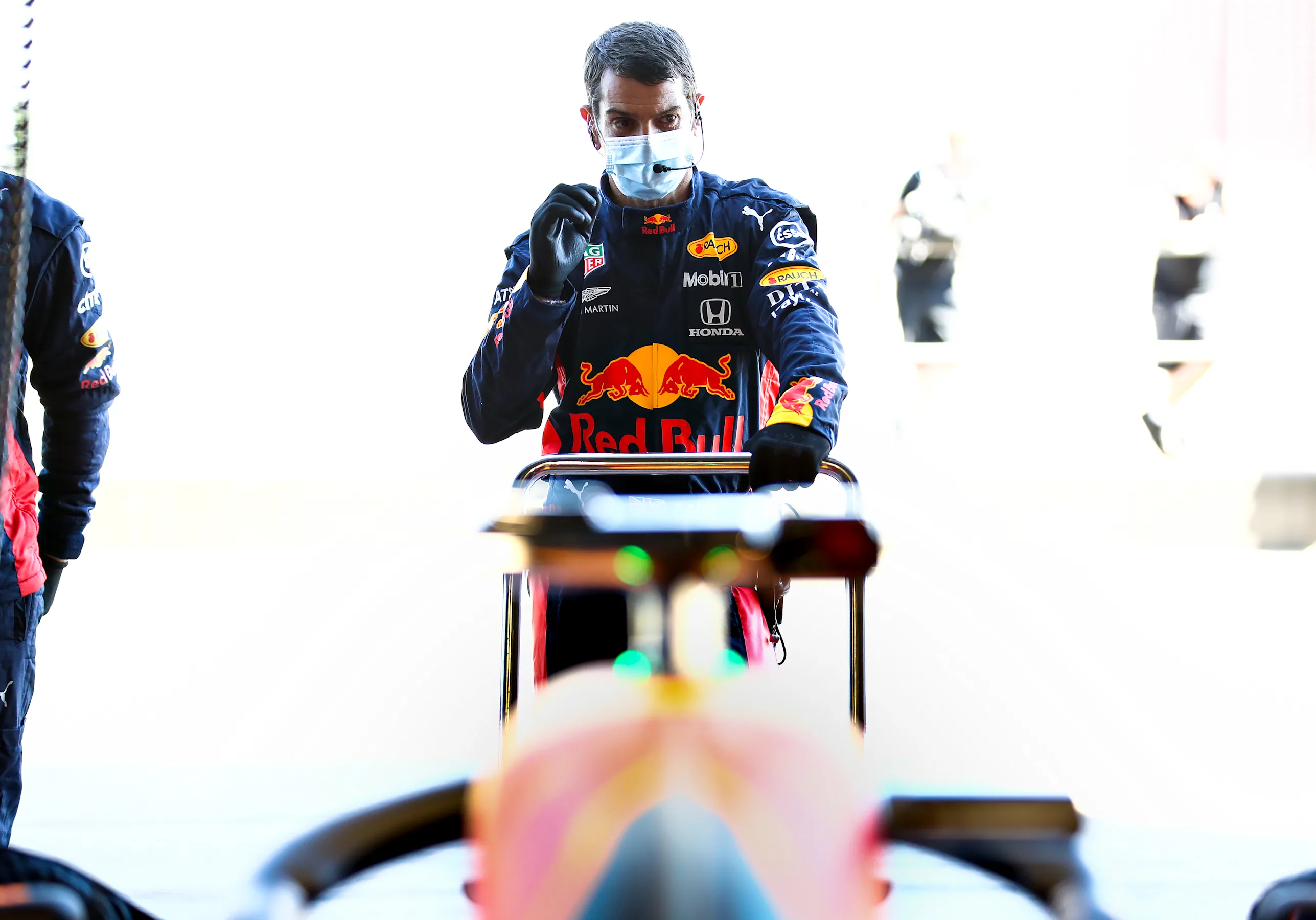 NORTHAMPTON, ENGLAND - JUNE 25: Chris Gent of Red Bull Racing works in the garage during the Red