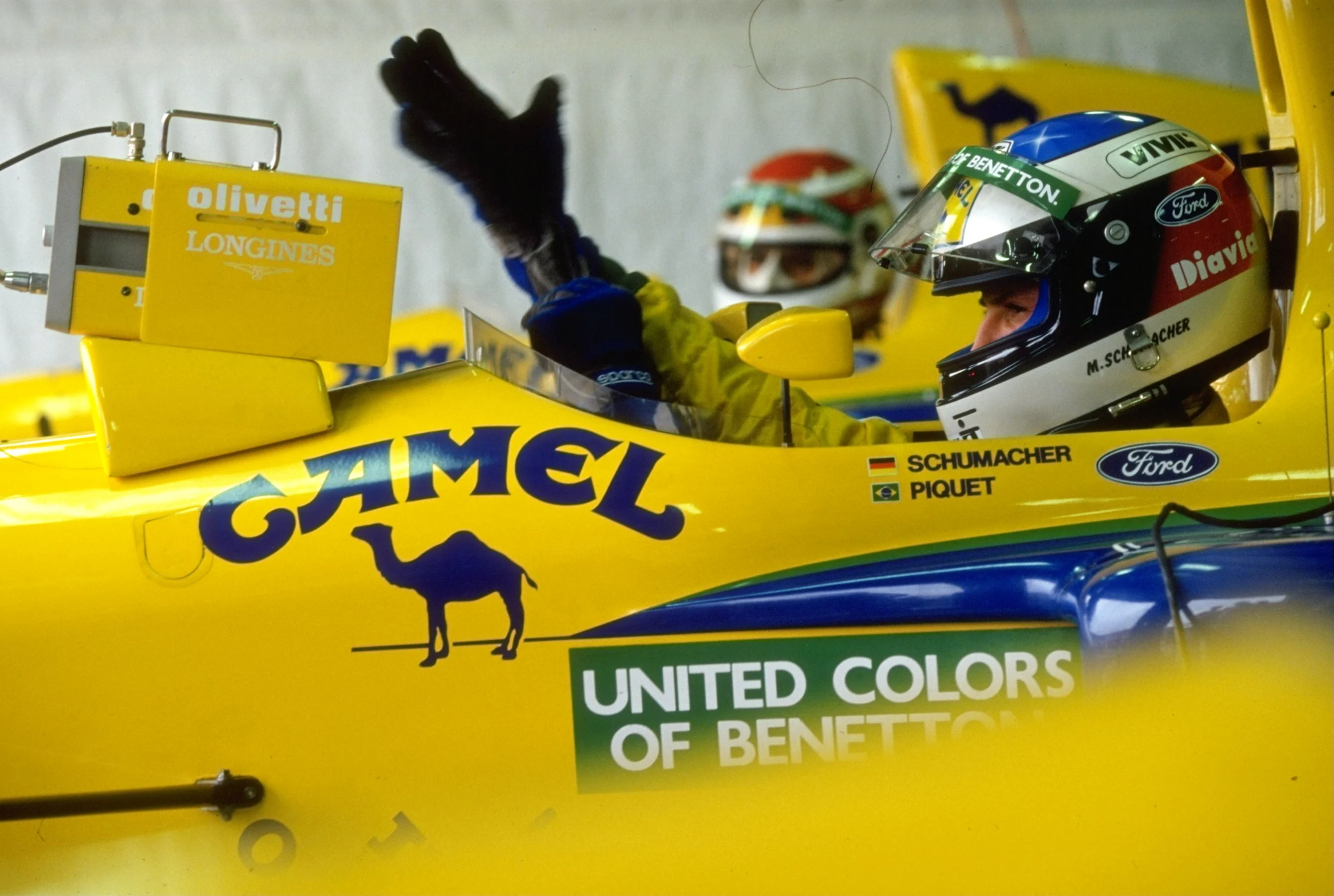 1991: Side view of Michael Schumacher of Germany in his Benetton Ford before the Australian Grand