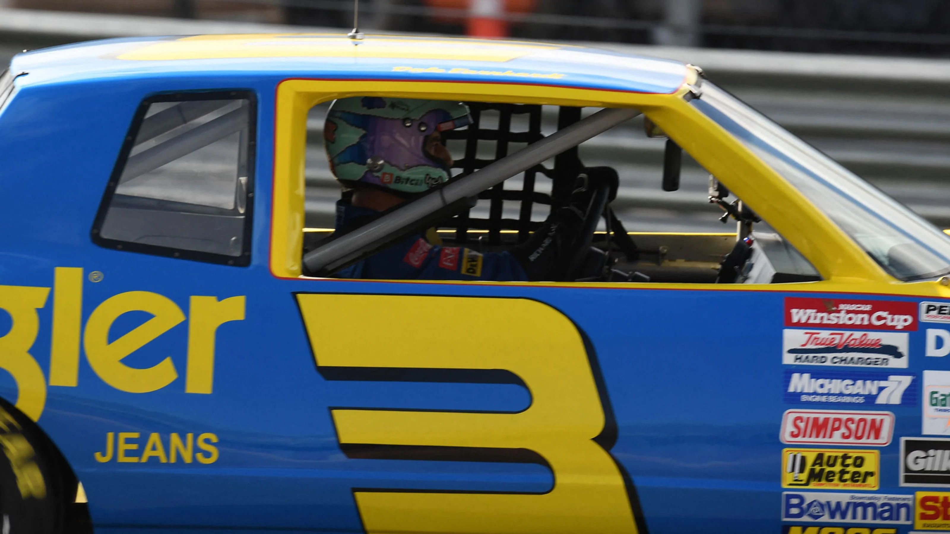 McLarens Australian driver Daniel Ricciardo drives the NASCAR 1984 Dale Earnhardt Cup car on the