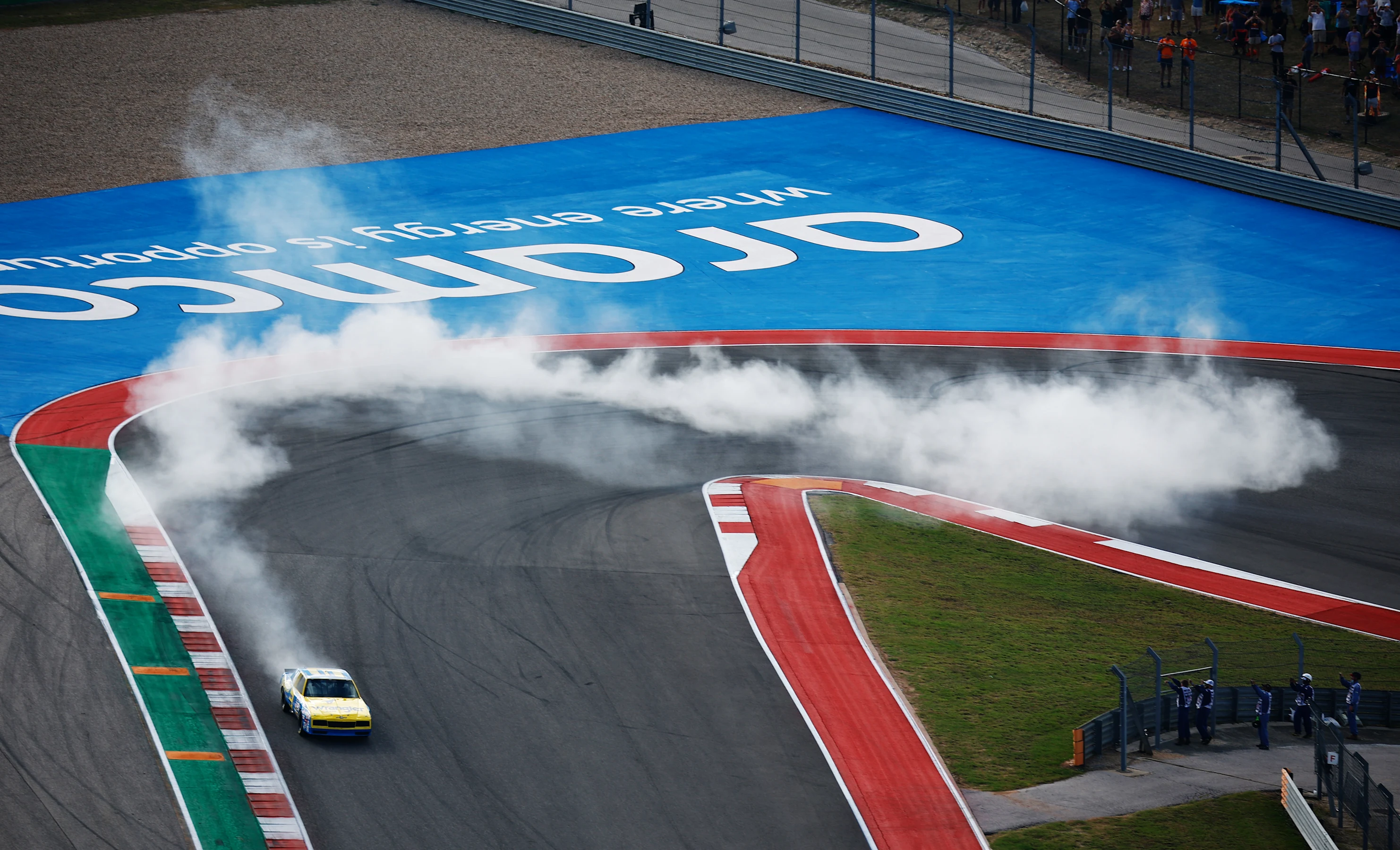 AUSTIN, TEXAS - OCTOBER 23: Daniel Ricciardo of Australia and McLaren F1 performs a showrun in Dale