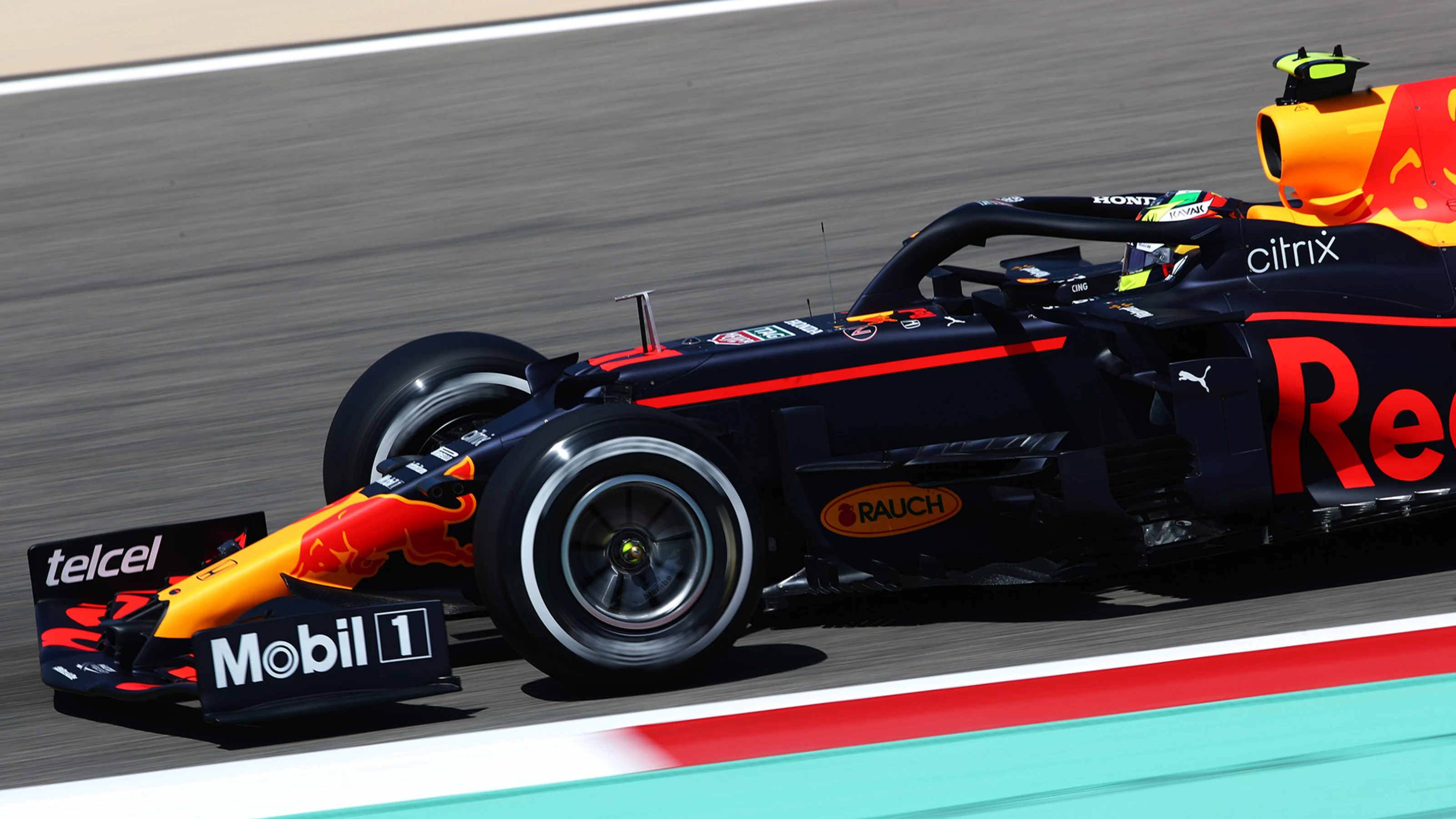 BAHRAIN, BAHRAIN - MARCH 14: Sergio Perez of Mexico driving the (11) Red Bull Racing RB16B Honda on
